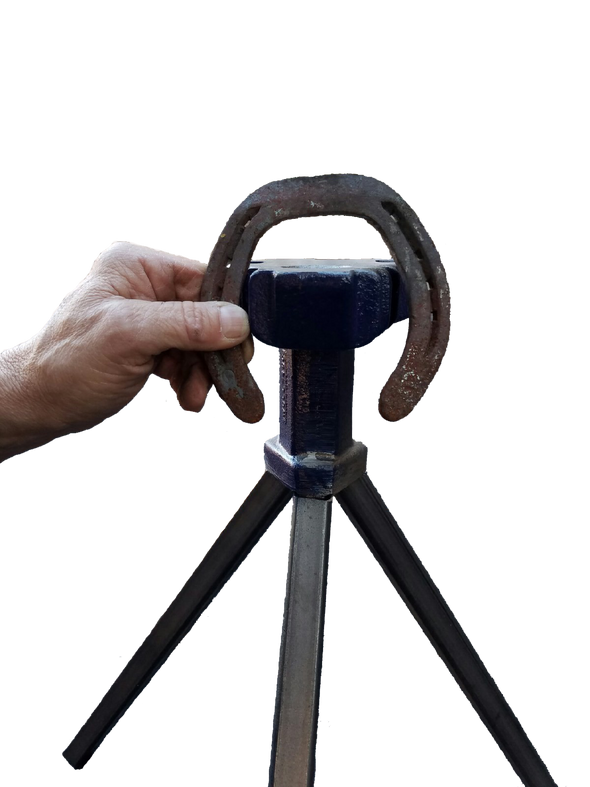 Horse shoe fitting around the farrier tool
